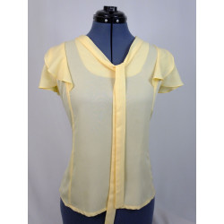 Blusa amarilla volantes en...